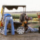 Emergency repairs at ranch east of Forsyth, Montana. Helped by two ranchers/professional rodeo cowboys (anybody know their names?)
